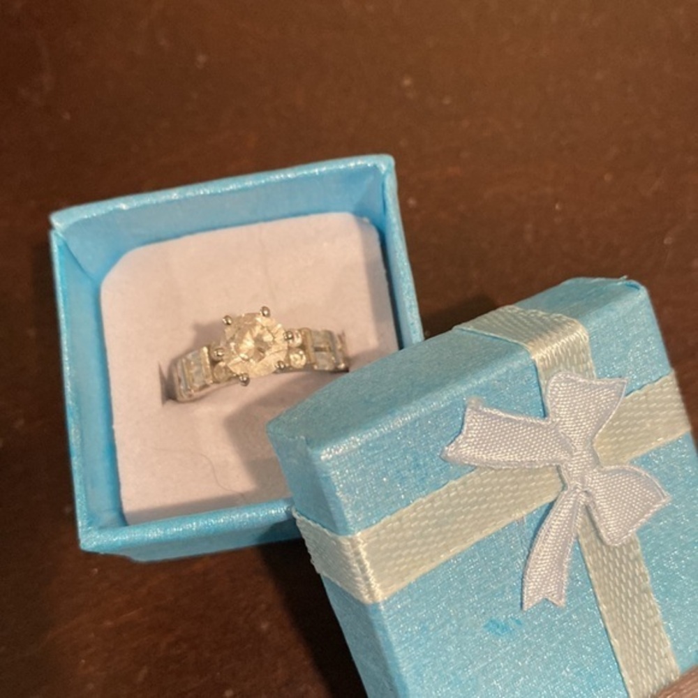 Previous QVC diamonique jewelry line cz round and baguette ring,ss/rhodium